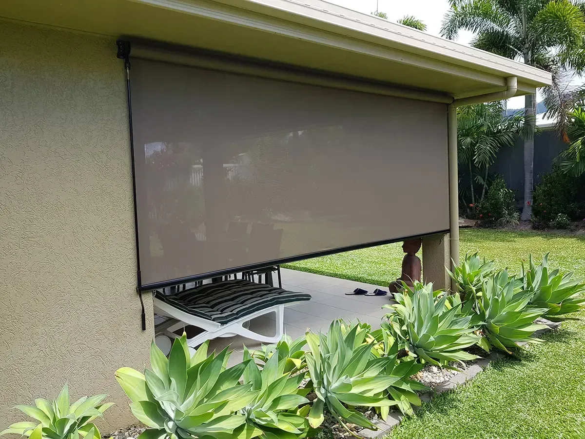A Brown Outdoor Patio Privacy Screen Partially Rolled Down — Advantage Screen And Blinds Rockhampton in Rockhampton, QLD