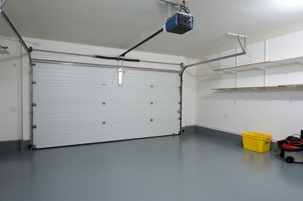 Interior Of A Clean Garage In A House — Darwin Roller Door Services In Tivendale NT