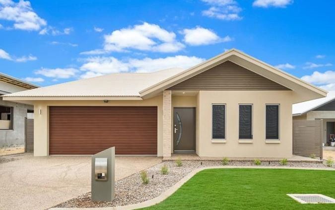 Timber Coat Roller Door in Macadamia Nutwood — Darwin Roller Door Services In Tivendale NT