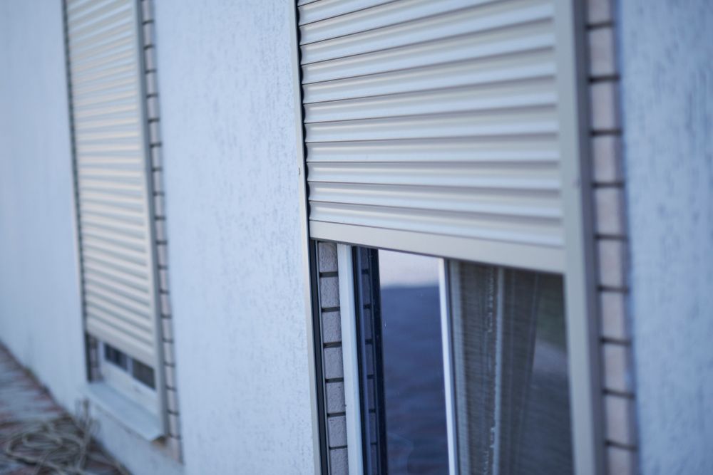 Close-up image of roller shutters half open.