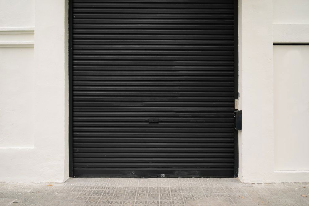 Black Garage Roller Door — Darwin Roller Door Services In Tivendale, NT