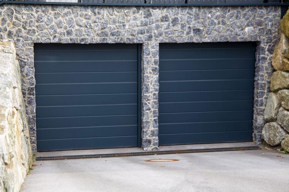 Blue Sectional Door — Darwin Roller Door Services In Tivendale, NT