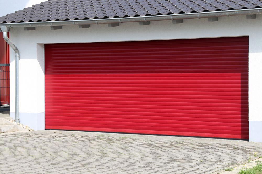 Red Roller Garage Doors Of A House — Darwin Roller Door Services In Tivendale, NT