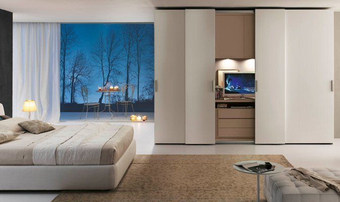 camera con armadio ad ante scorrevoli