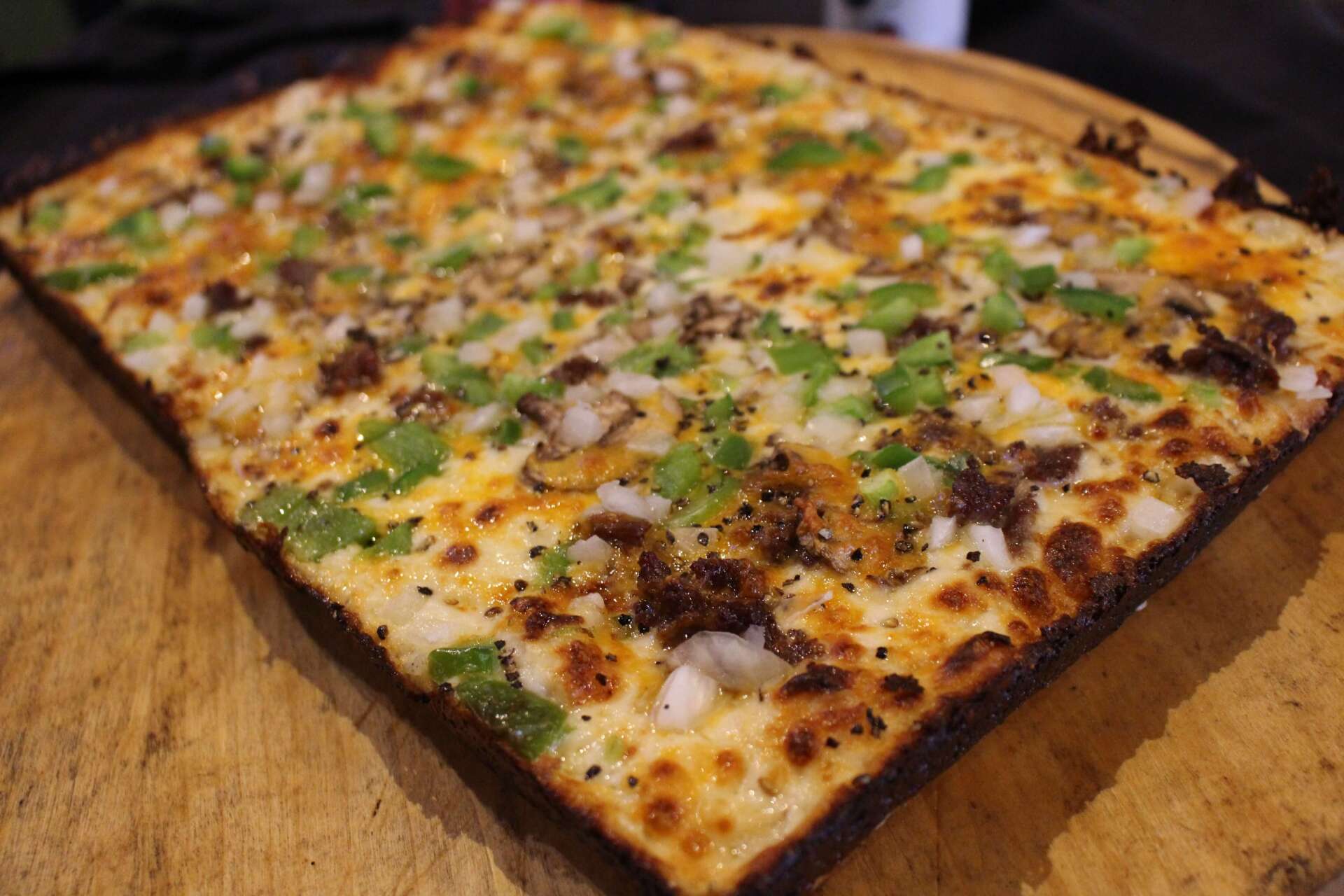 Order deep dish pizza at Little Camille's By The Green restaurant in Casco, MI