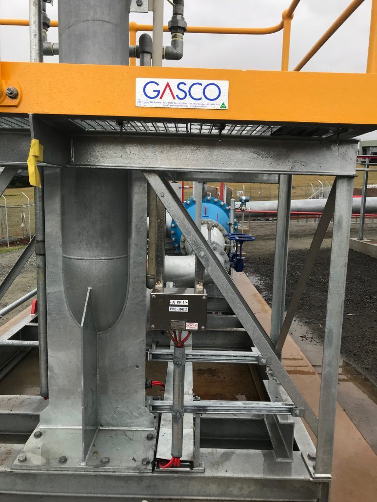 A metal structure with a gasco sticker on it