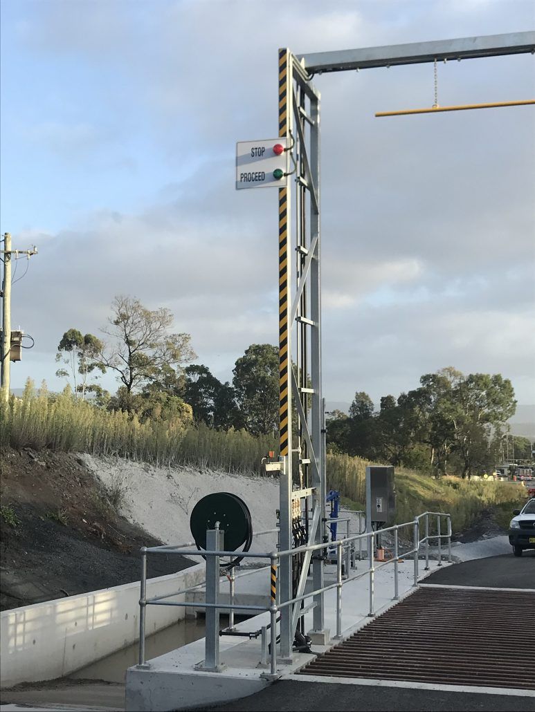 A fenced in area with a sign that says ' a ' on it