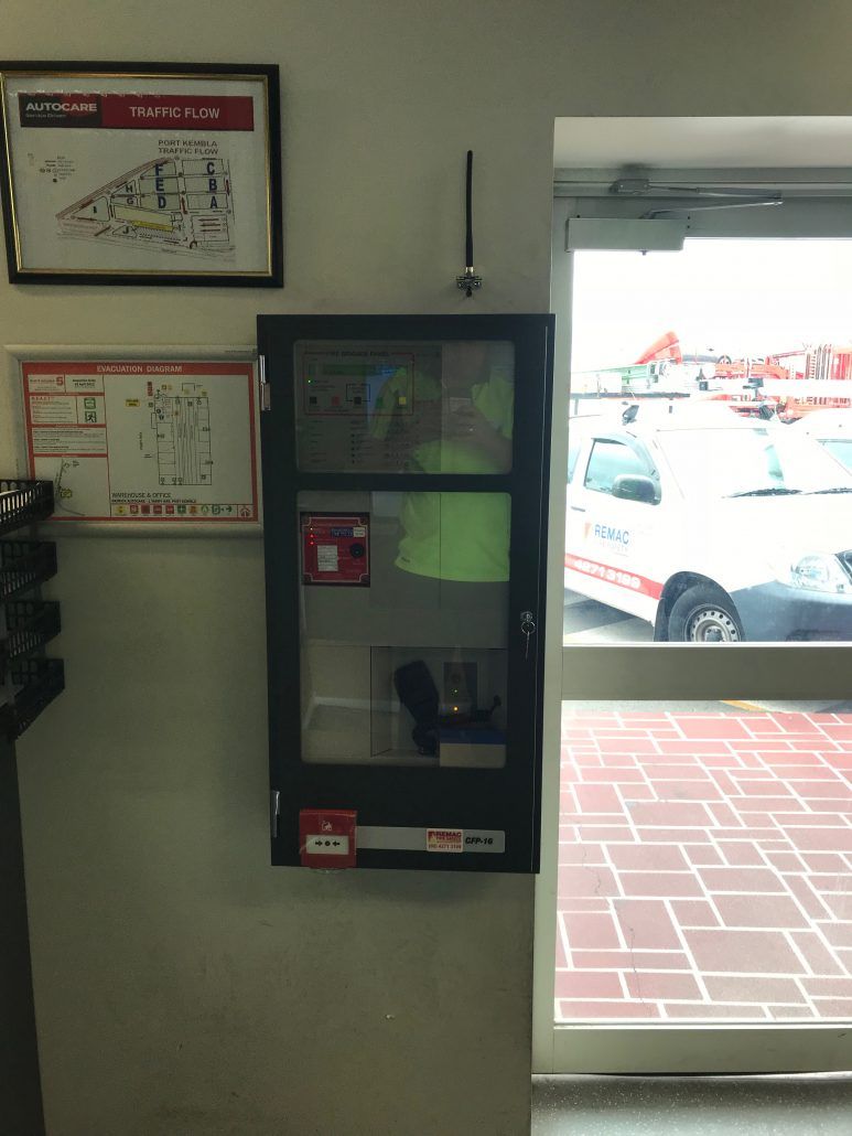 A doorway with a map on the wall above it