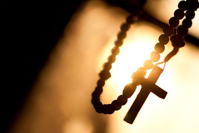 Rosary with Sunset Background — Revival Center in Olathe, KS