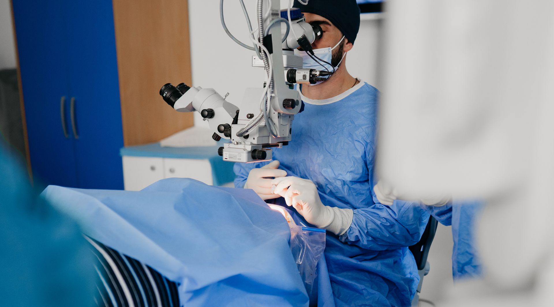 A surgeon performing cataract surgery in the operating room, ensuring precise vision restoration.