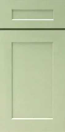 A close up of a green cabinet door on a white background.