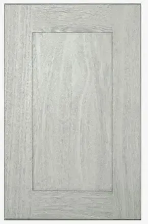 A close up of a white wooden cabinet door on a white background.