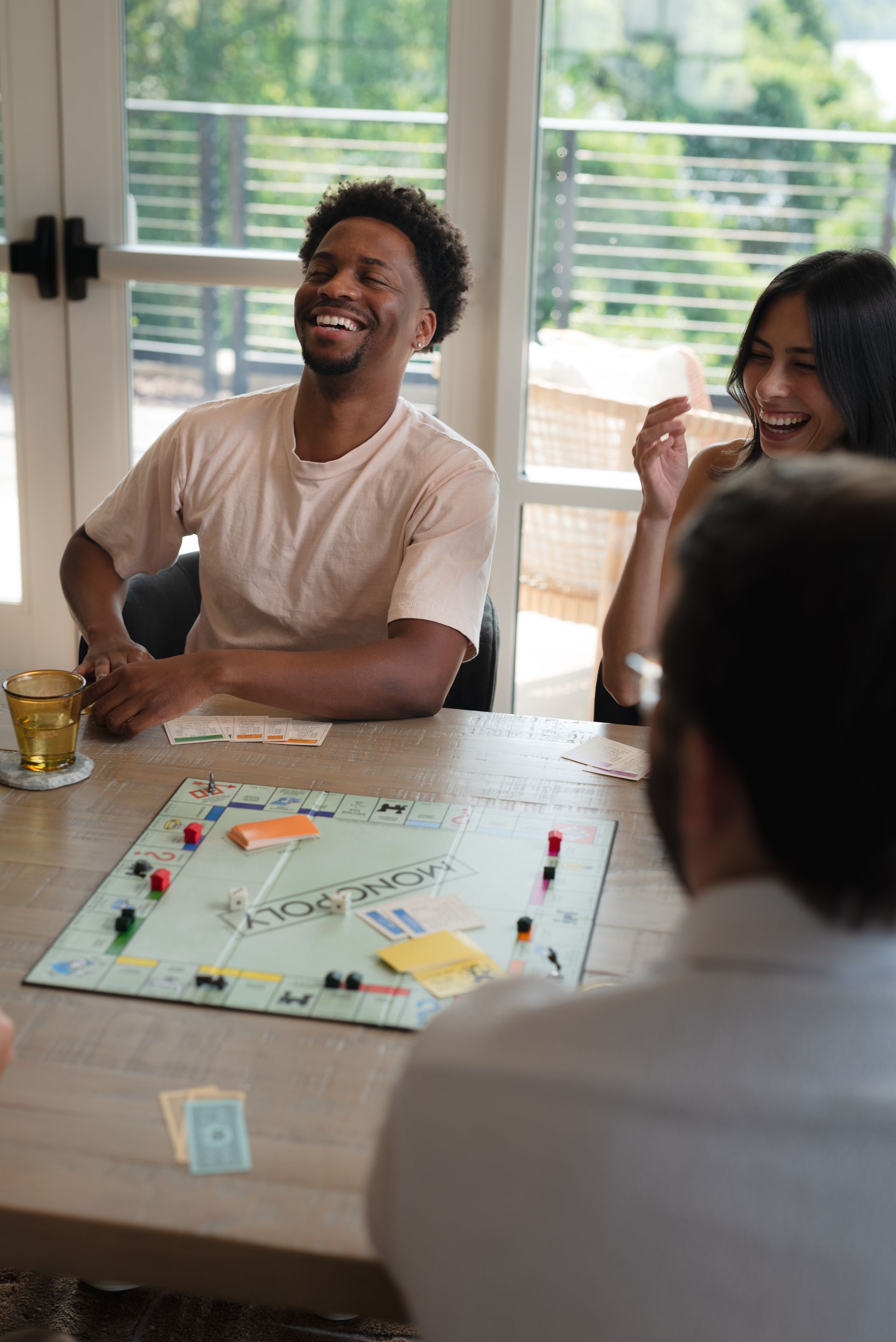 People playing a board game.
