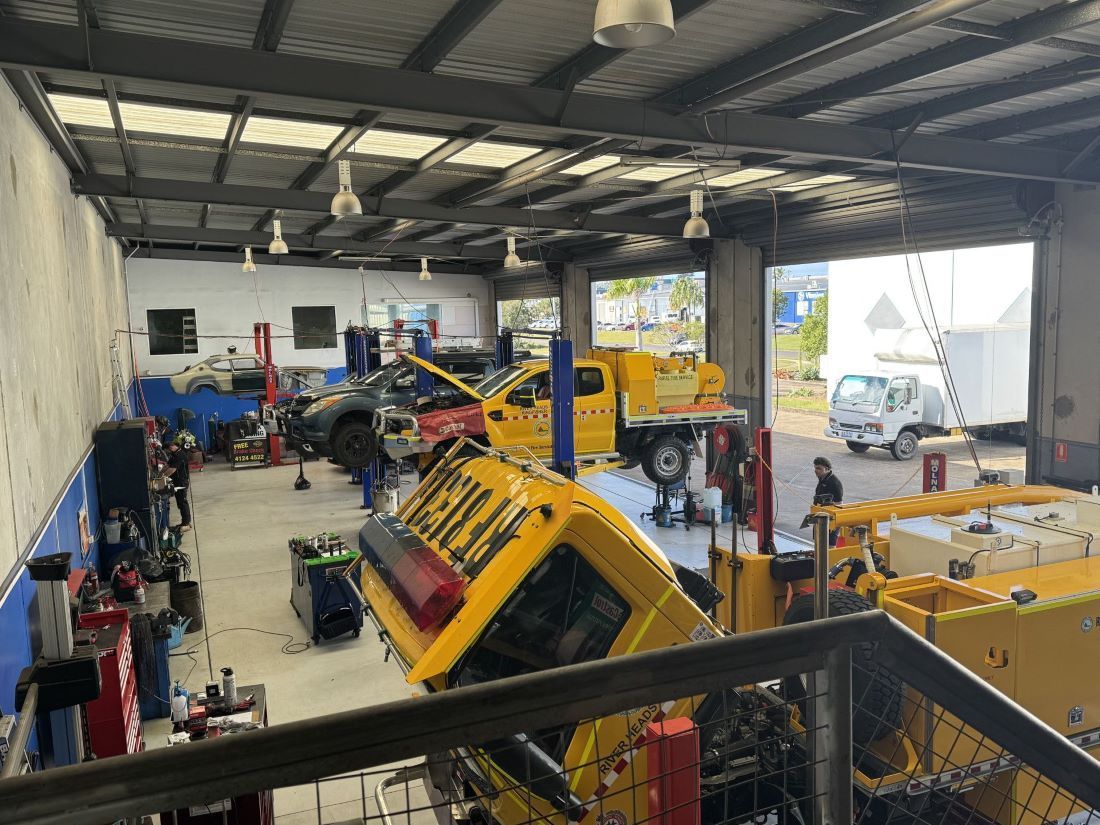 Vehicles Inside a Garage with Tools and Equipment Around — Pialba Brake Clutch & Steering in Pialba, QLD