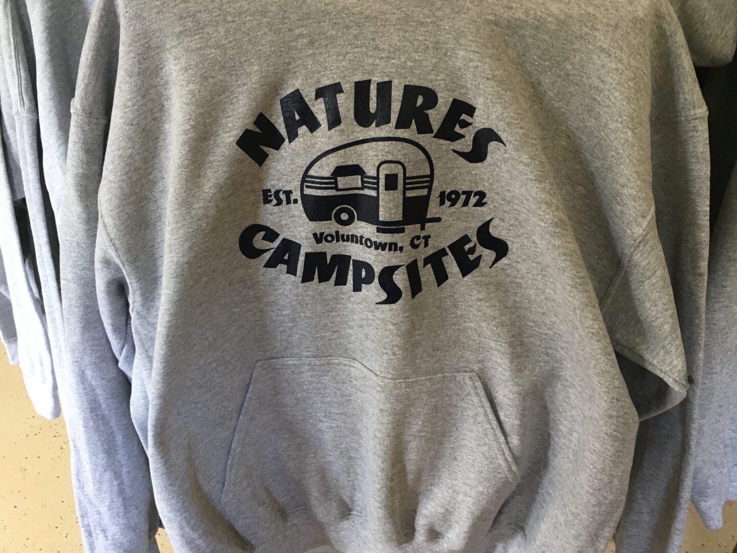 A grey sweatshirt with the words natures campsites on it