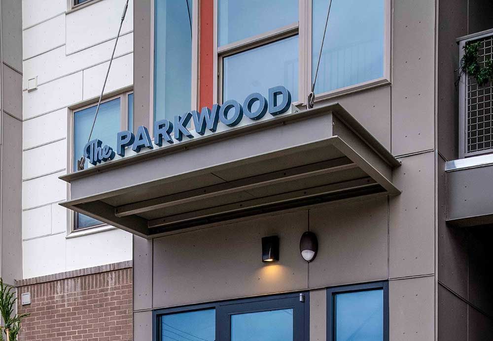 Energy-saving custom awning signage on storefront in Raleigh NC