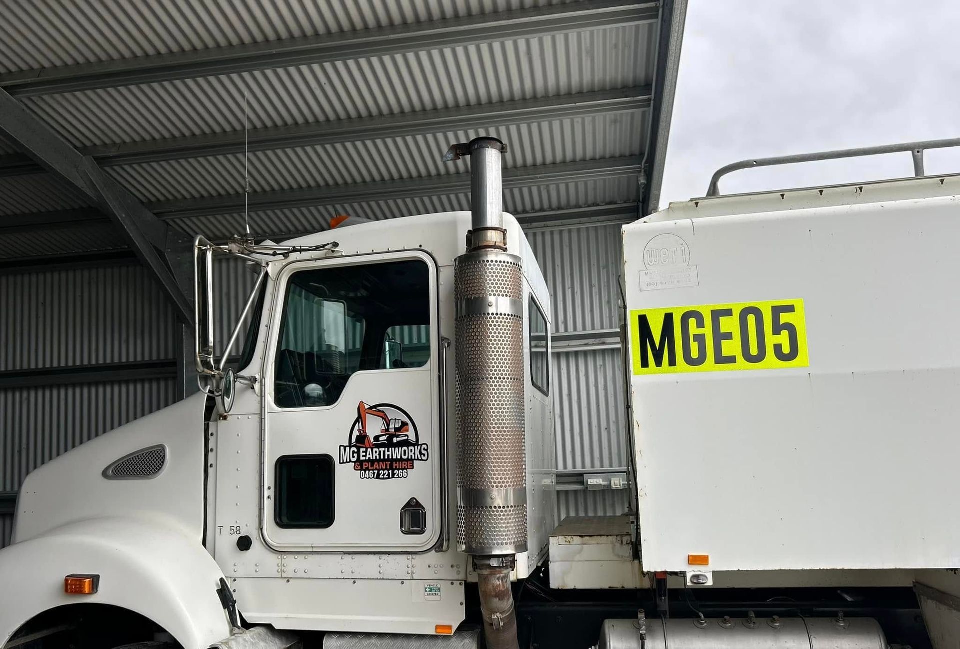 White Truck With a Tall Exhaust Pipe — MG Earthworks and Plant Hire in Gumma, NSW