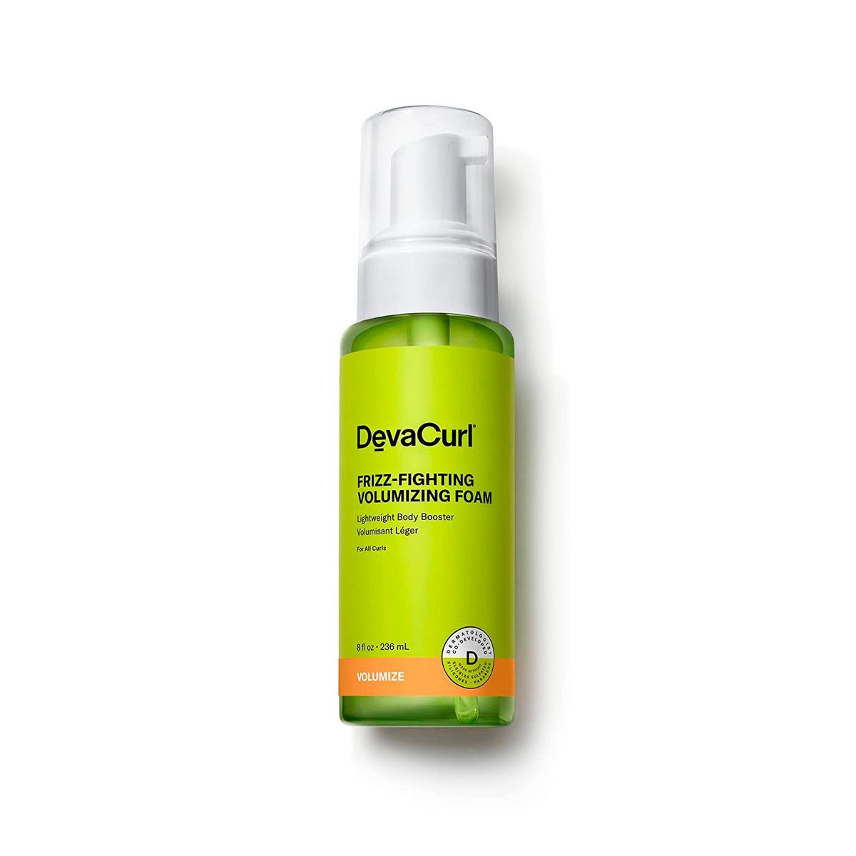 A green bottle of deva curl mousse on a white background.