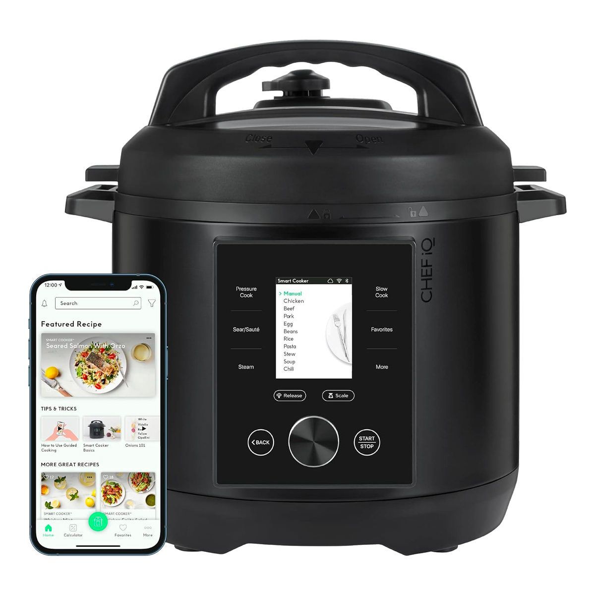 A black pressure cooker with a smart phone next to it.