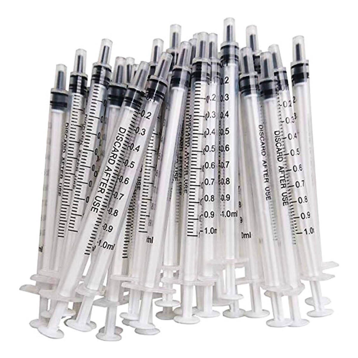 A bunch of syringes are stacked on top of each other