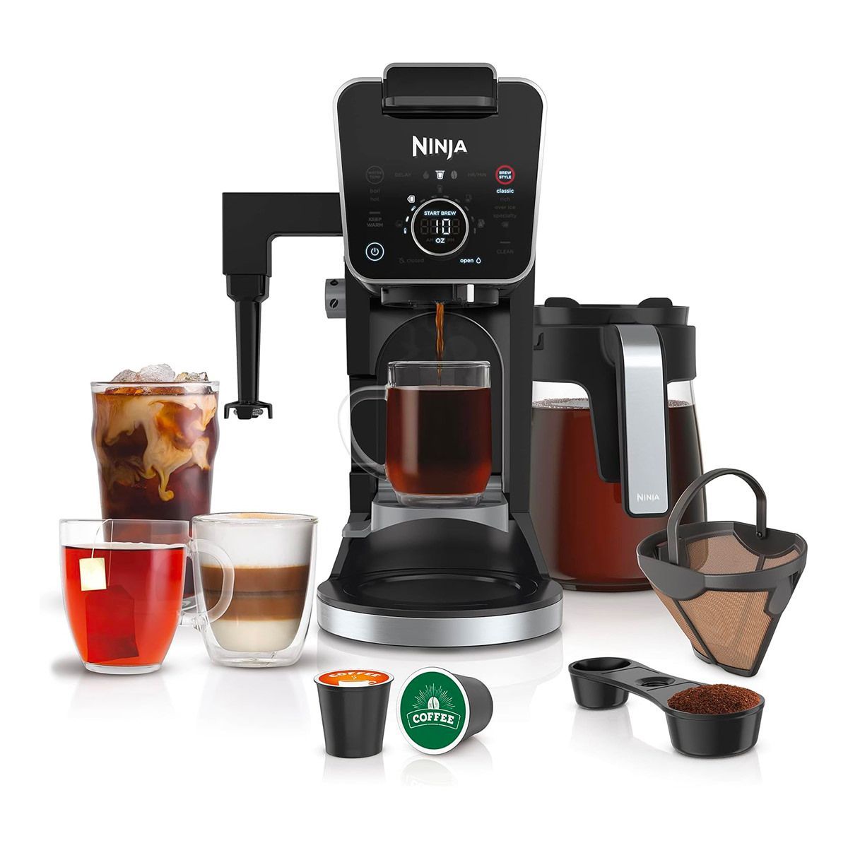 A ninja coffee maker is surrounded by cups of coffee and tea.