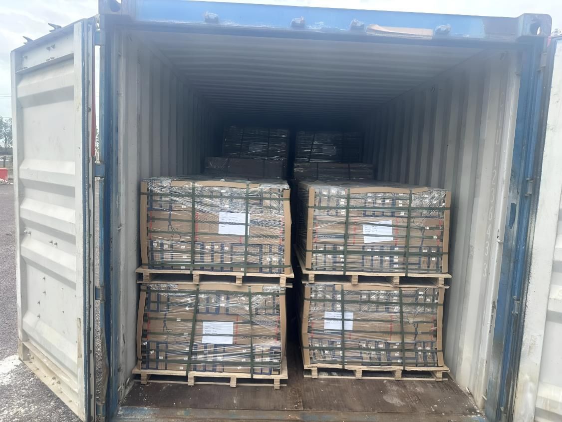 A Shipping Container Filled With Pallets Of Bricks — Tile Centre NT In Winnellie, NT