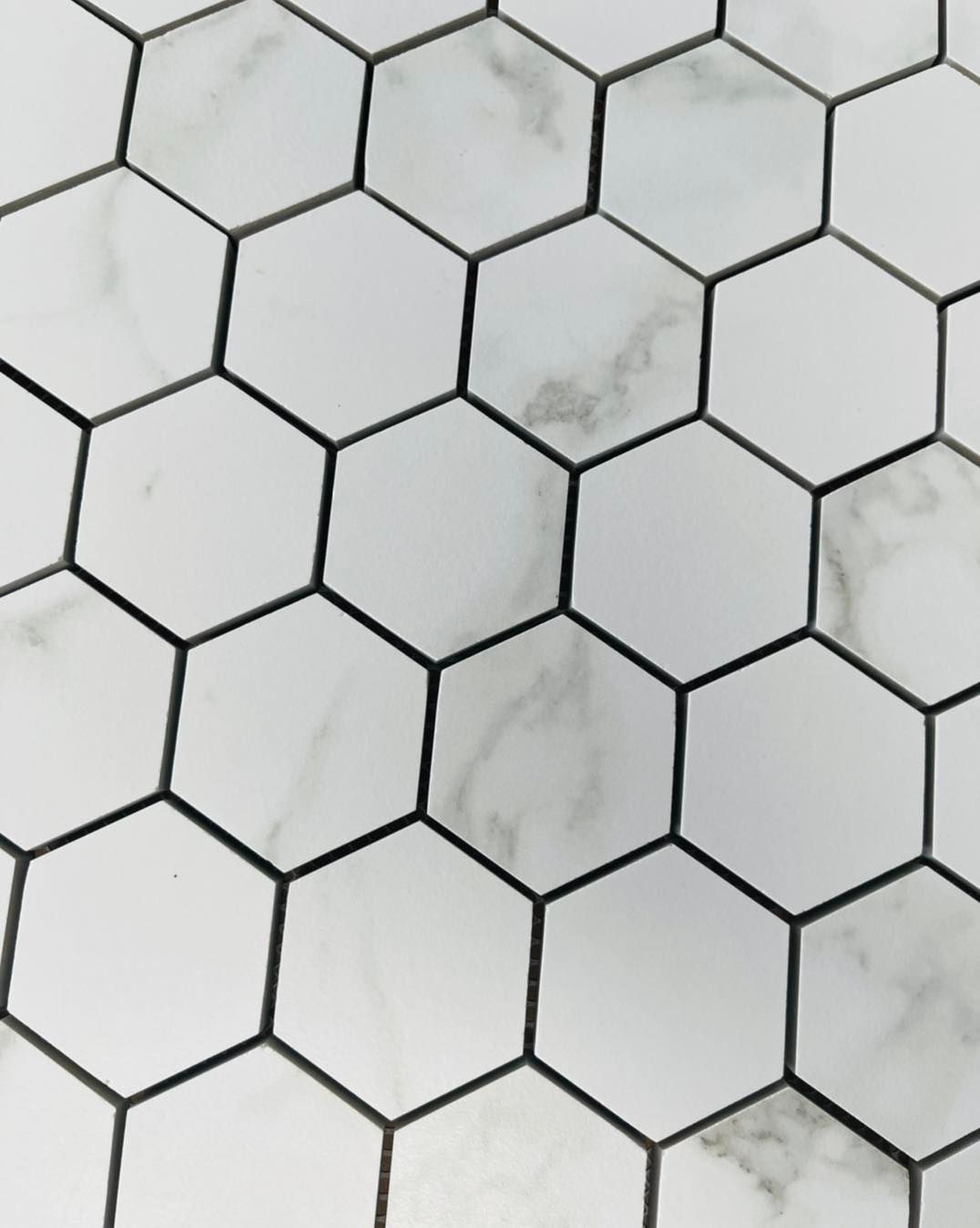 A Close Up Of A Honeycomb Pattern On A Tile Floor — Tile Centre NT In Winnellie, NT