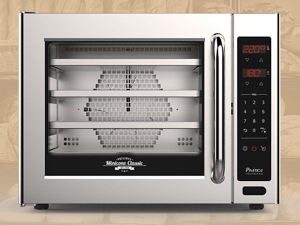 Un horno de acero inoxidable con una pantalla digital que marca las 3:00.