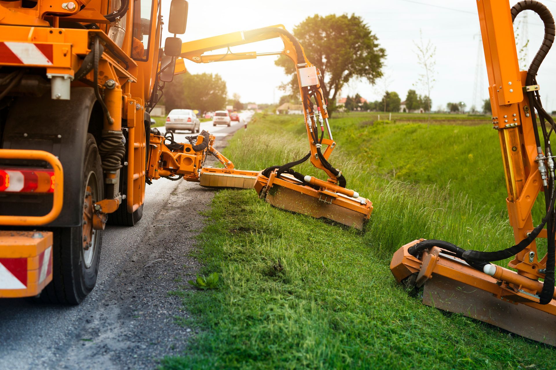 Professional Industrial Machine Cutting Grass by the Road for Traffic Safety | Benalla, Vic | Darrel's Diggers