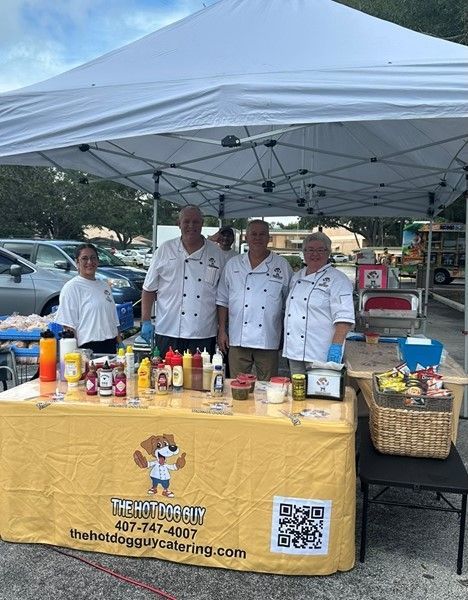 Serving Up Smiles: The Hot Dog Guy Serves at Westminster Winter Park, Orlando, FL.