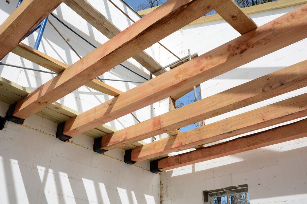 Wooden Rafters Installed on a White Wall — Wilko Plate (Aust) Pty Ltd in Mackay, QLD