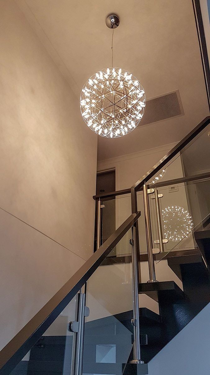 A Computer Desk With Two Monitors and a Chair in a Room — Gunter Electrical In Kariong, NSW