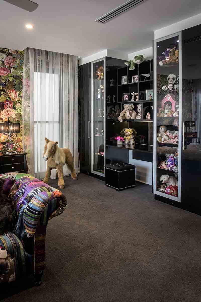 A Living Room Filled With Lots of Stuffed Animals and a Rocking Horse — Designer Kitchens in Berrimah, NT