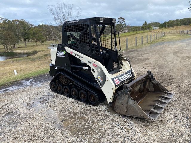 Mini Backhoe Dig The Ground Hole And Work — Quality Excavation in Boomerang Beach, NSW
