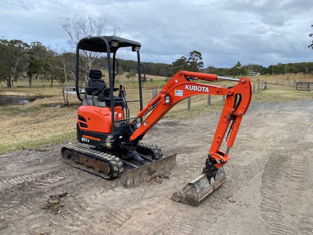 The Modern Excavator Performs Excavation Work On The Construction — Excavator & Mini Excavator Hire in Boomerang Beach, NSW