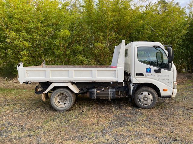 View Side Front White Tripper Truck — Tipper Hire in Boomerang Beach, NSW