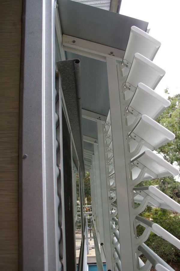 Building With a Lot of Windows and Shutters on It — Blind Outfitters in Gordonvale, QLD