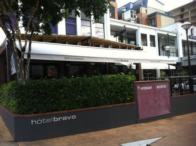 Building With a Sign That Says Hotel Bravo on It — Blind Outfitters in Atherton, QLD