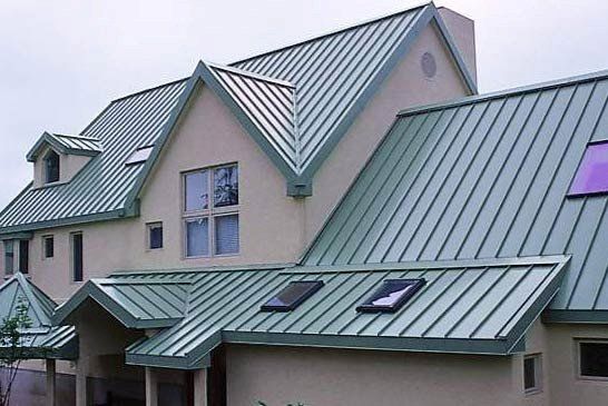 Home with green metal roof