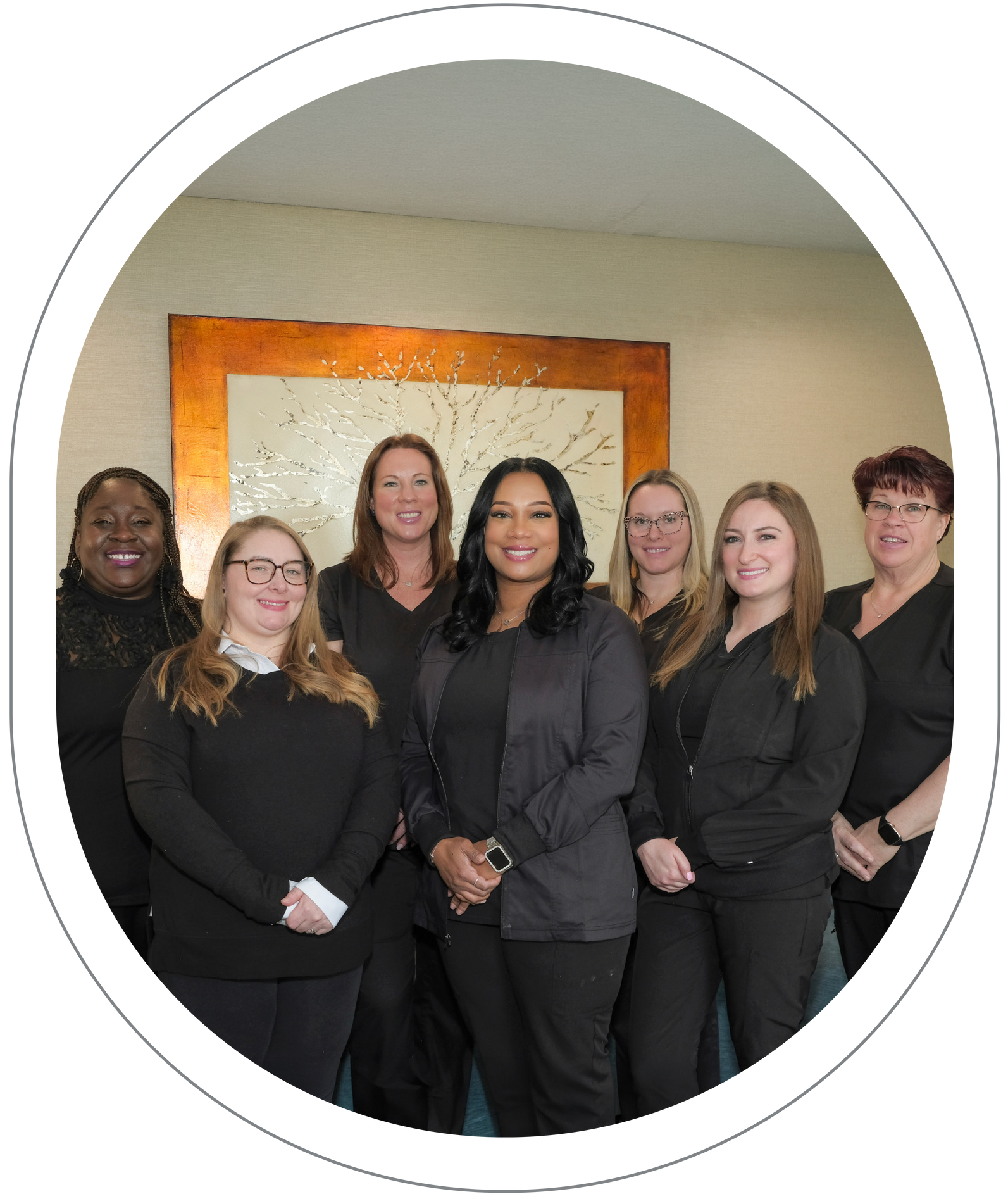 Dental assistant adjusting x-ray machine at Vail Dental Associates in Hunt Valley, MD, 21030.
