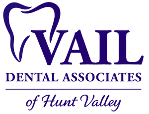 Logo for Vail Dental Associates of Hunt Valley; blue tooth graphic and text.