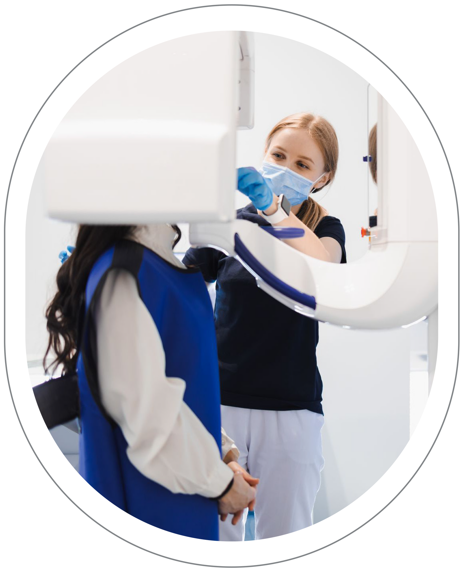 Dental assistant adjusting x-ray machine at Vail Dental Associates in Hunt Valley, MD, 21030.