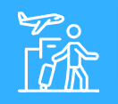 A man with a suitcase is standing in front of an airplane.