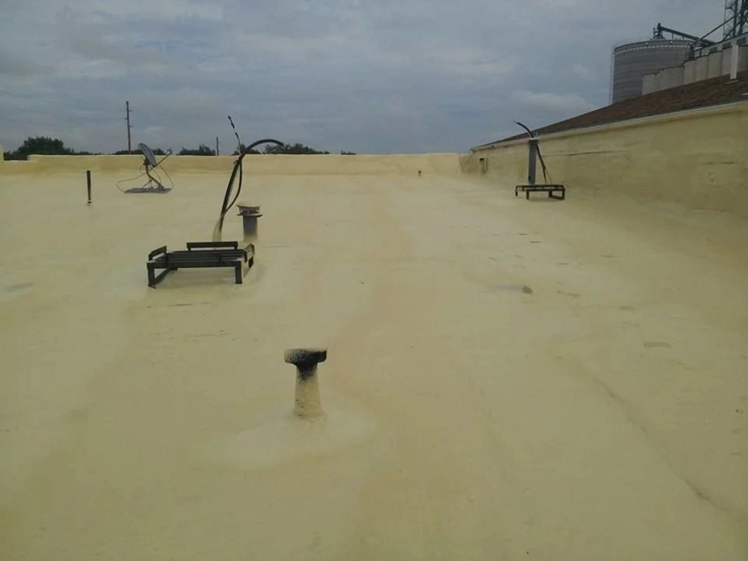 A roof with a lot of yellow foam on it.