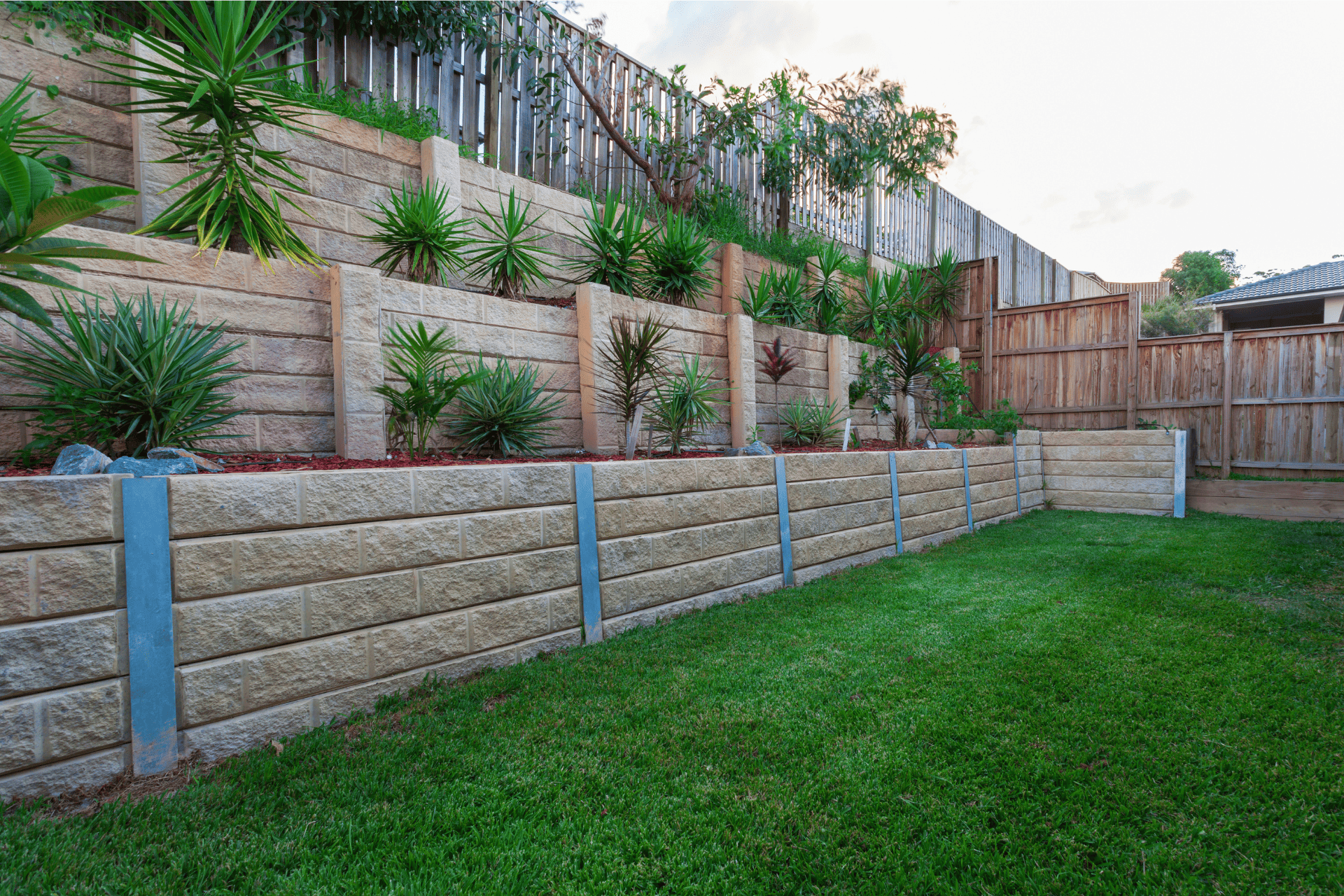 Timber Retaining Walls Built By Richmond Landscapes In The Backyard Of Richmond Home