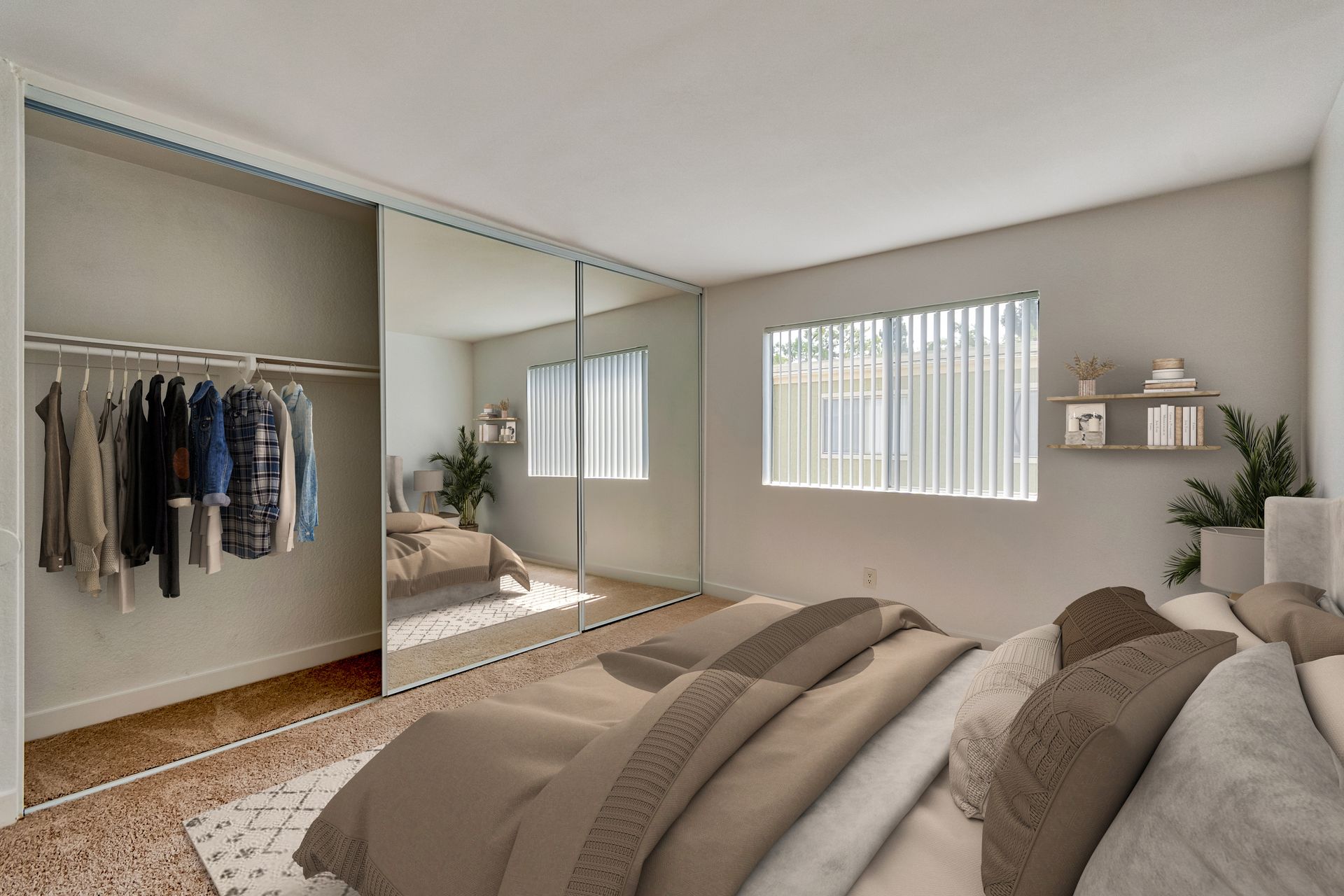 A bedroom with a large bed and a walk in closet.