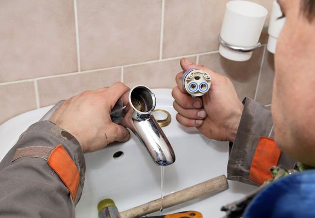 fixing a broken faucet fixing a broken faucet