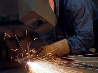 Man Welding - Welding Services in Rockfold, IL