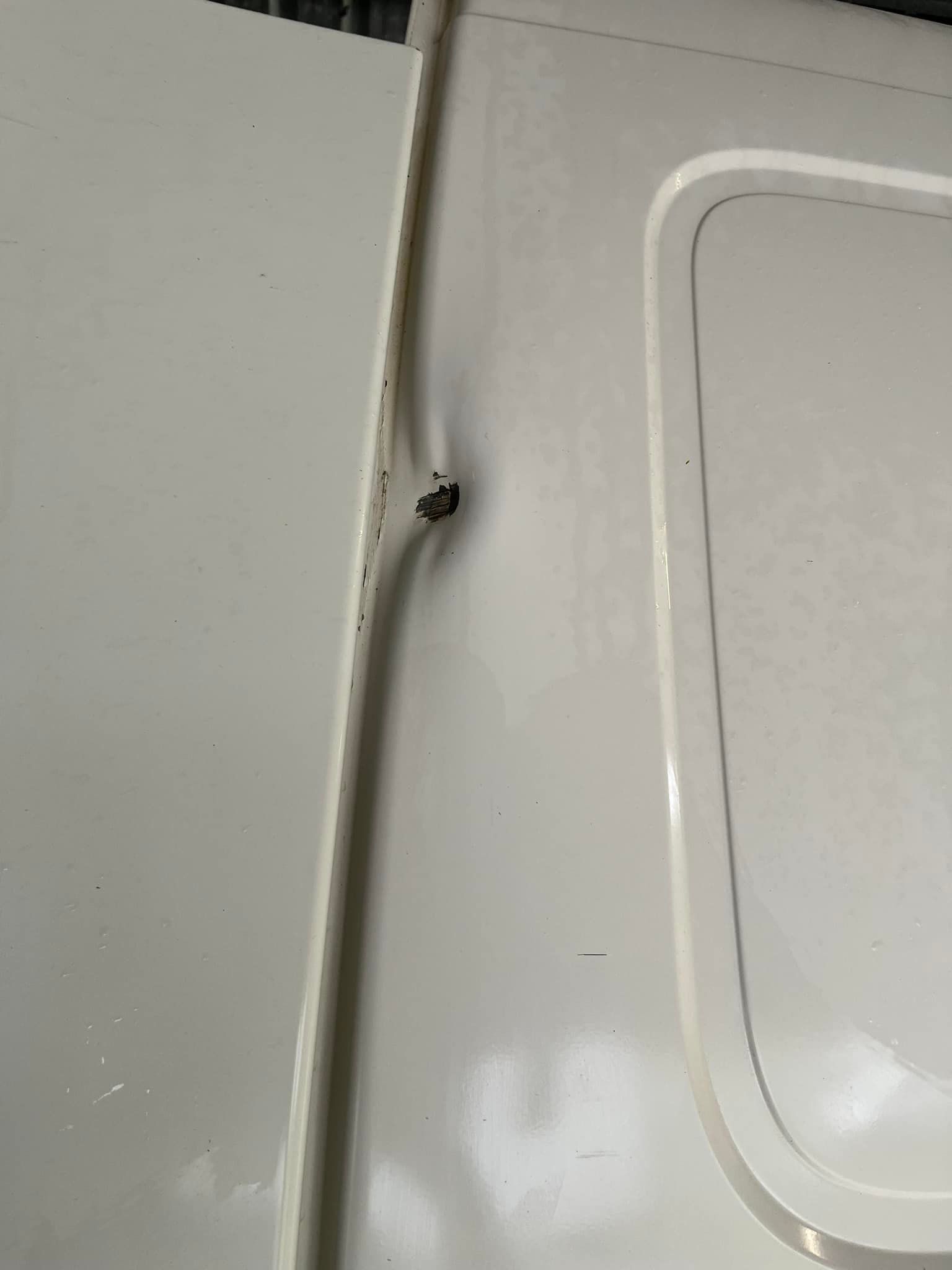 a Close Up of a White Van Door With a Hole in It. — FSK Paint & Panel in Casino, NSW 