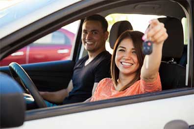 Couple in a car, holding car keys | Billings, MT | All Lock, Inc.
